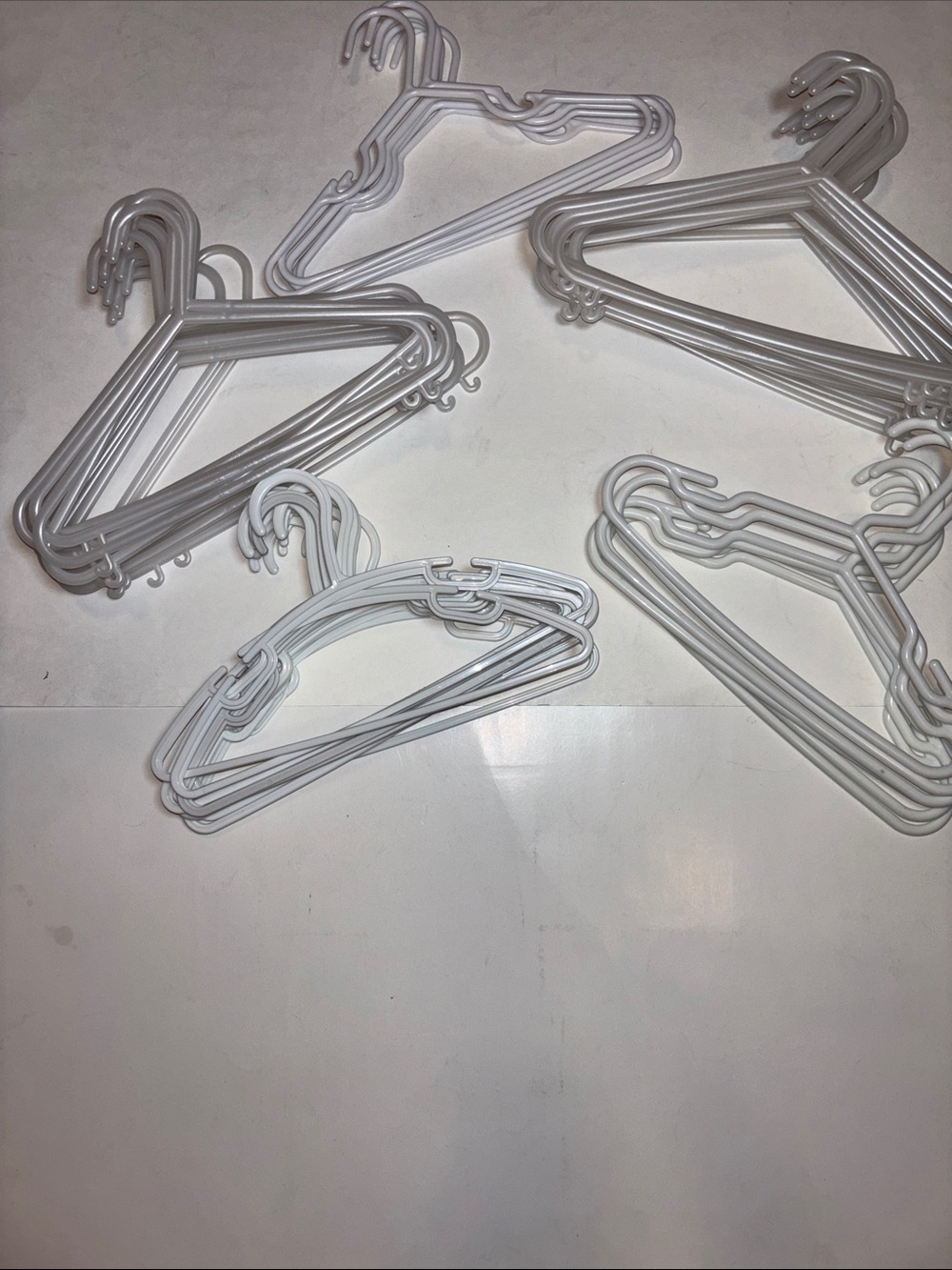 56 White Assorted Plastic Closet Hangers